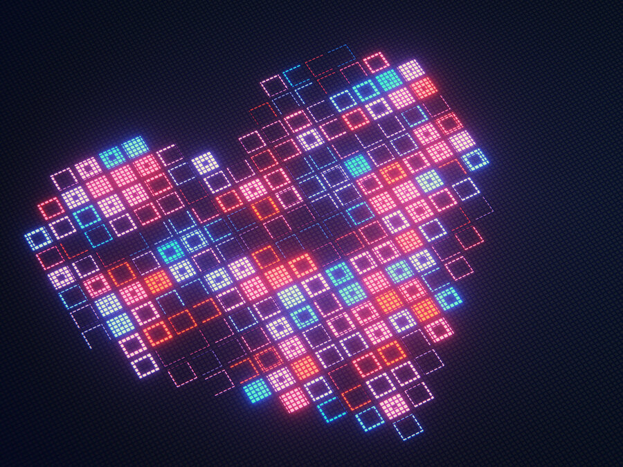 Digitale Illustration eines Herzens, zusammengesetzt aus zahlreichen leuchtenden quadratischen Pixeln in Rot-, Pink-, Orange-, Türkis- und Blautönen vor dunklem Hintergrund.